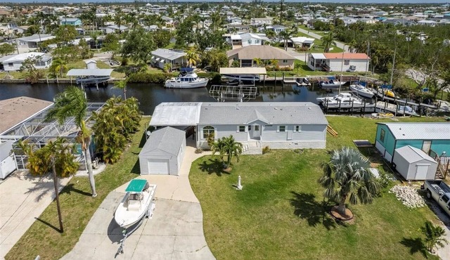 Relax at 710 El Dorado Dr, canal waterfront property with private dock