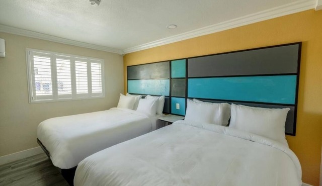Relax in a 2 Queen Beds Room for Family Stays in Victorville – 3 Rooms