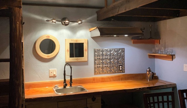 Relax in a cozy one-room cabin on a working farm with a private electric sauna.