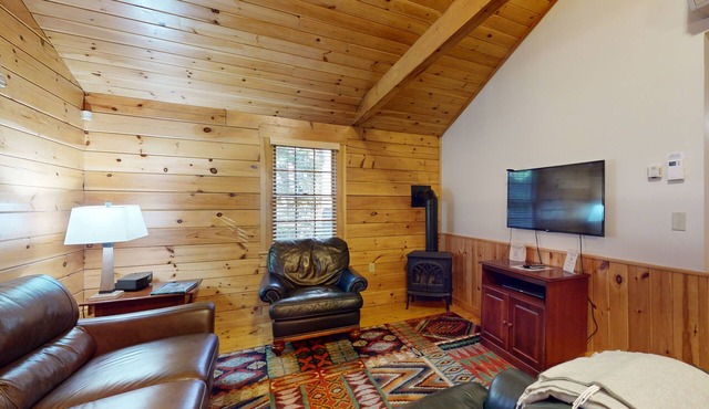 Relax in a two-bedroom cabin with fireplace, AC & access to outdoor adventures