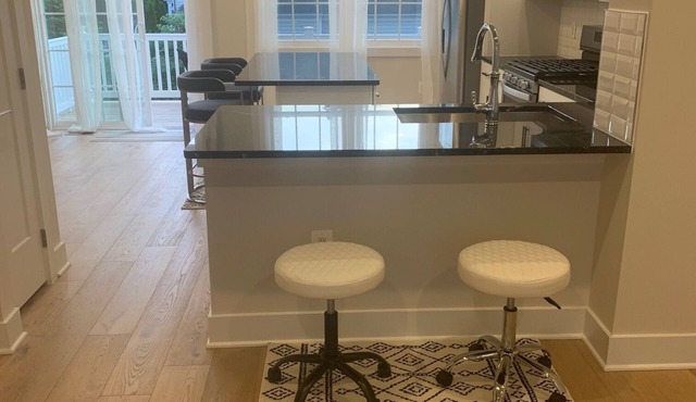 Relax in an upscale modern new town house. 10 minutes from Dulles Int'l Airport.