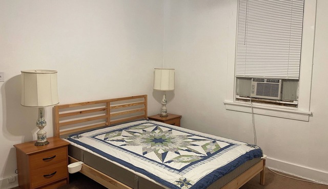 Relax in beautiful second floor apartment with balcony & private fenced yard.