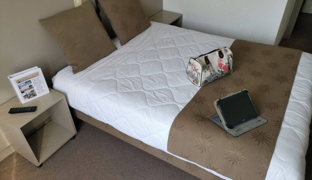 Relax in Comfort, Pet-Friendly Rooms with Parking and Easy Access to Attractions