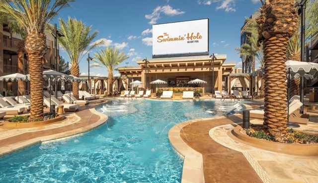 Relax in Comfort with a King Bed and Stunning Poolside Views