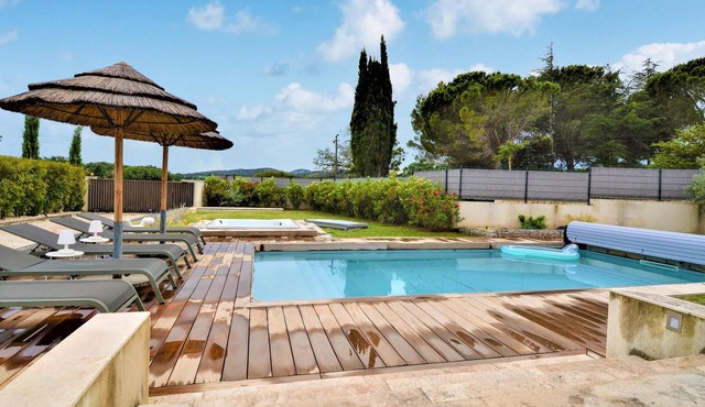 Relax in this vacation home with pool surrounded by beautiful nature.
