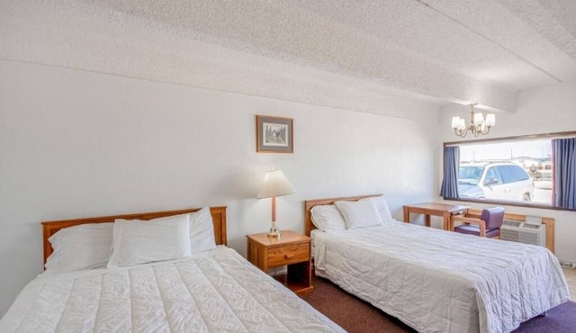 Relax in Our 3-Queen Rooms – Perfect for a Restful Overnight Stay