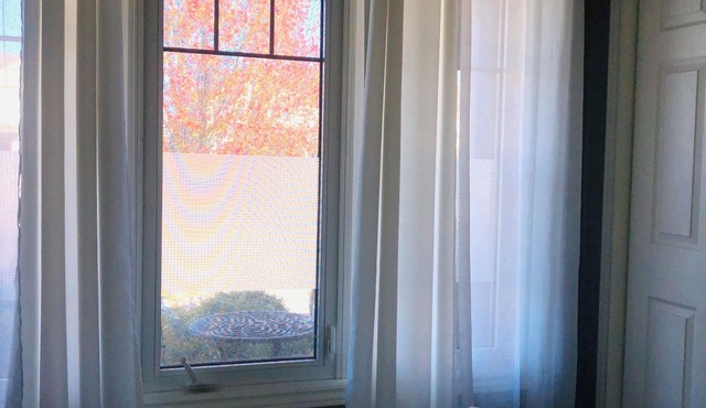 Relax in our cozy room with a private bath, designed for comfort and privacy.