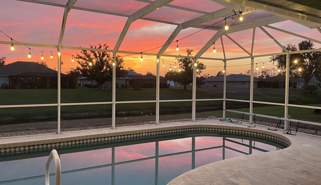 Relax in Paradise: Open 3-Bedroom Pool Home on Canal near Beaches, Golf, Parks