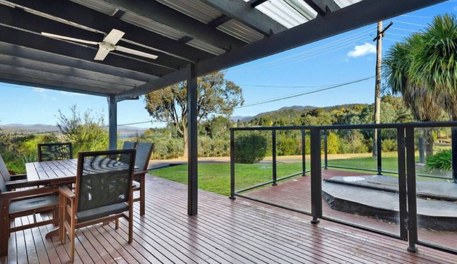 Relax in the spa with views opposite Lake Eildon