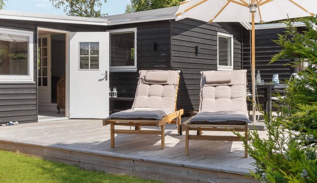 Relax in this cozy and tasteful vacation home near the beach.