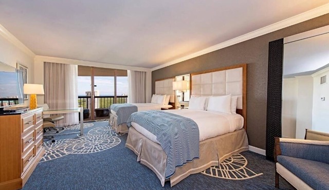 Relax in Three Relaxing Rooms with Balcony, Beach & Outdoor Pool Access