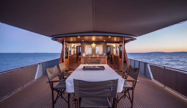 Relax on a stunning classic motor yacht in a soothing waterfront setting