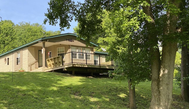 Relax on the enchanting bank of the White River.