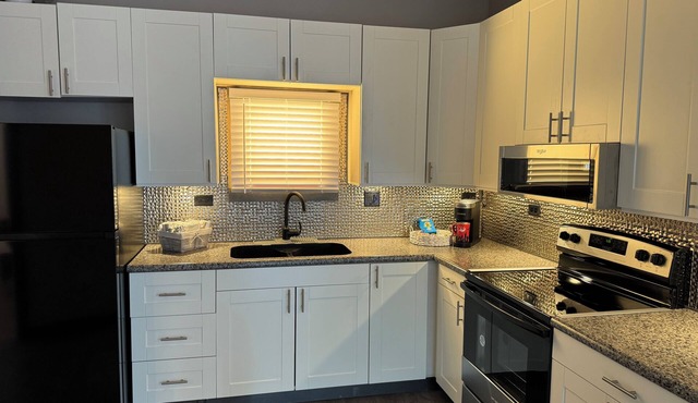 Relax on the Sugar River in this beautiful newly renovated building