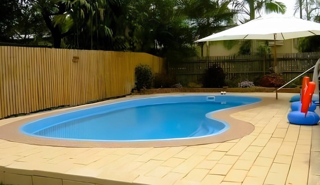 Relax & Unwind: 5BR Home with Pool Near CBD