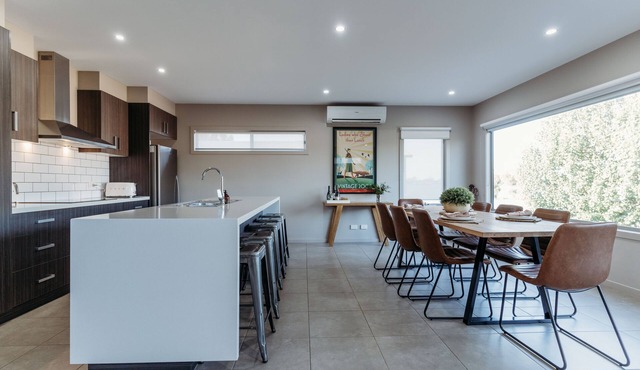 Relax & watch magical sunsets upstairs balconies overlooking the beautiful lake