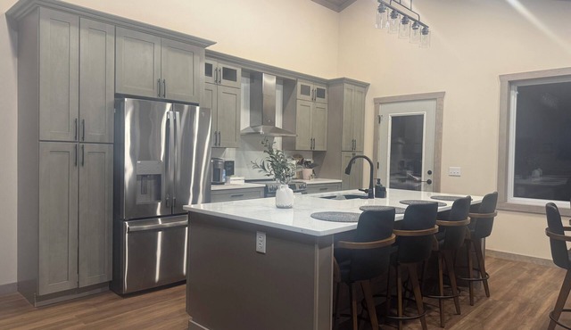 Relaxing 2 bedroom home on the Trout River views of historic train trestle.