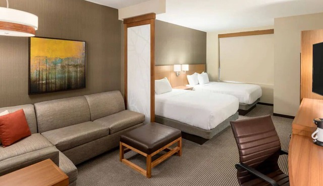 Relaxing 2 Queen Bed Stay Near Peace Center! Onsite Gym and Pool Access!