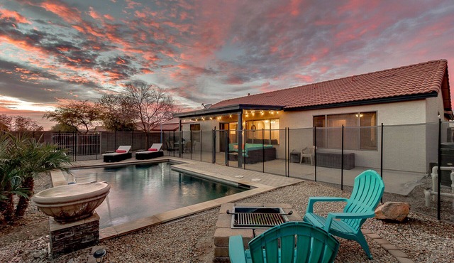 Relaxing 4 Bedroom Home with Sparkling Heated Pool!