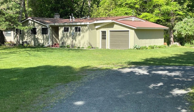 Relaxing cozy cabin on beautiful Pere Marquette River - Recently Renovated!