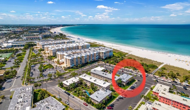 Relaxing GROUND floor condo ~ walk out to pool and the beach. FN #103