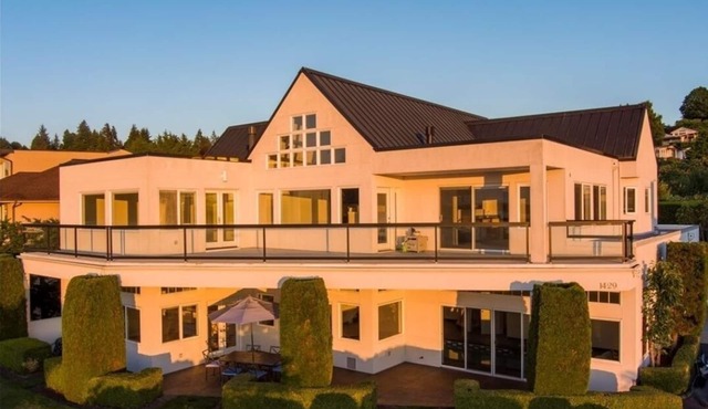 Relaxing in an Entire 5,400sf Beach View Home With Indoor Heated Swimming Pool.