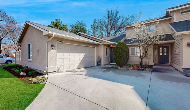 Relaxing retreat with a gas fireplace, fenced yard, patio, & washer/dryer