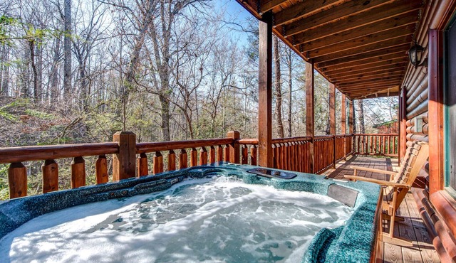Relaxing Wooded Views with a Hot Tub and Pool Table for Ultimate Comfort