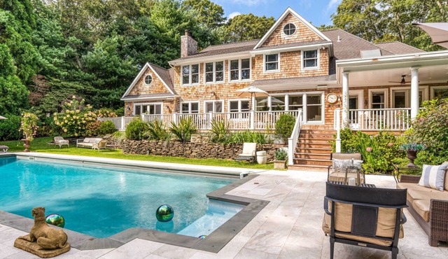 Remarkable Hamptons estate, resort-style amenities, large pool, multiple.