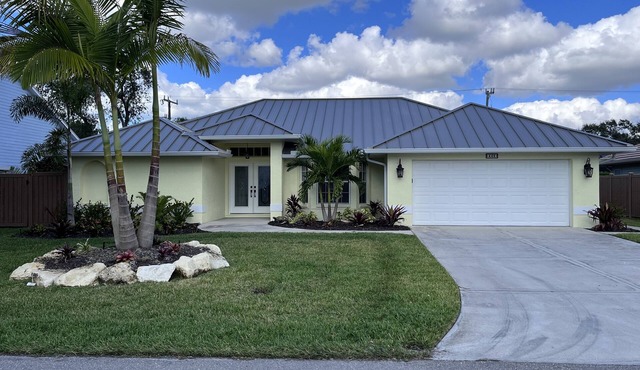 REMODELED BEACH HOUSE STEPS FROM THE GULF OF MEXICO WITH POOL