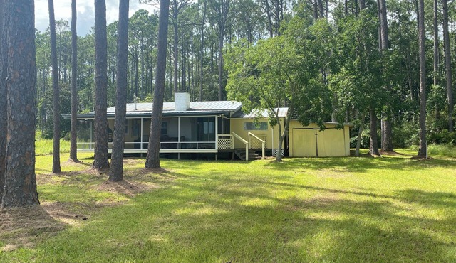 Remodeled historic cottage with a peek of the Gulf of Mexico.
