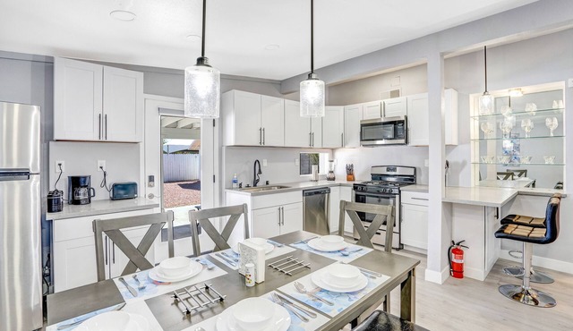 Remodeled Home with Lush Landscapes, King Beds, BBQ, Games, Workspace and More!