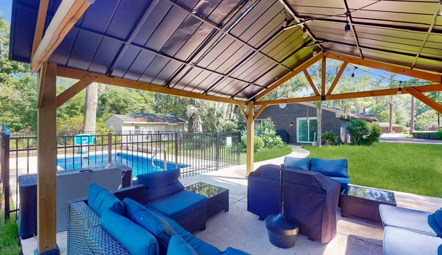 Remodeled home with pool/guest house, new pool, lovely yard & bright interior