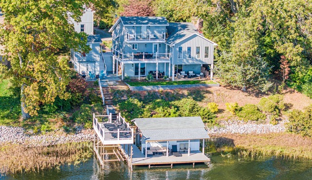 Remodeled Lake Retreat w/expansive main lake views with amazing amenities!