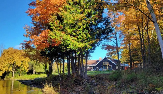 Remodeled lodge on 73 acres with 1/2 mile riverfront in Michigan's UP wilderness