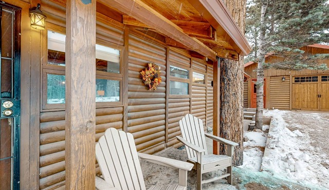 Remodeled wilderness retreat with game room, fireplaces, & deck