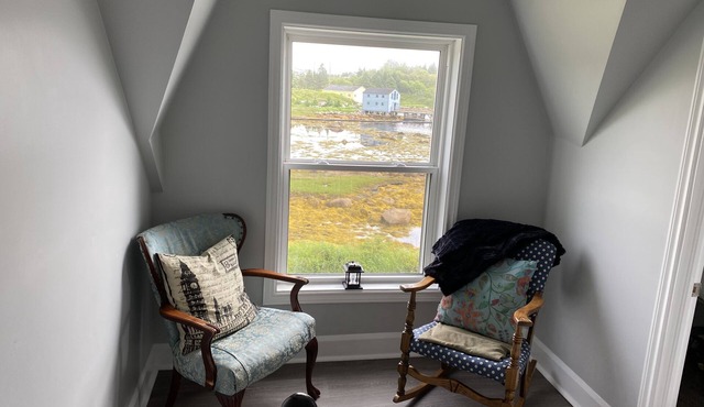 Renovated 150 year old house, snuggled in the cove with ocean views