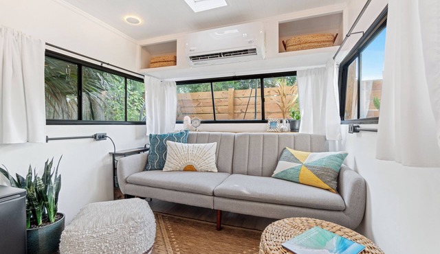Renovated 1970’s retro camper on Bayou Grande in Pensacola with walking trail.