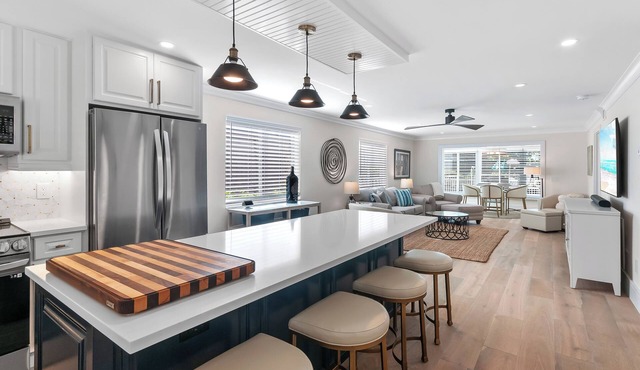 RENOVATED 2 Bed, 2 Bath 1st floor with heated pool on the bay!