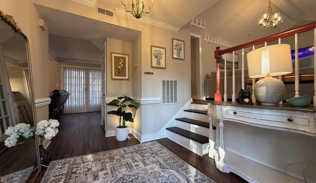Renovated 3BR & 2.5BA House with game room, deck, and a fenced yard