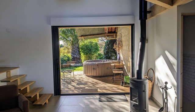 Renovated barn in the heart of a shared landscaped park