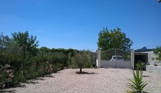 Renovated contemporary style house in small village, view of Pic Saint Loup