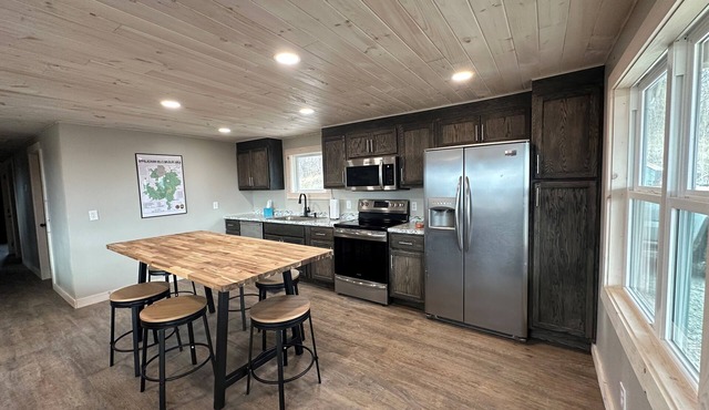 Renovated cottage w/incredible views of 54000 acres of public recreational land.