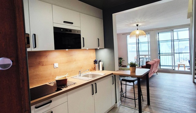 Renovated duplex apartment in residence on 3rd floor with elevator.