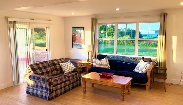 Renovated family cottage; walk to amazing beach, short drive to golf & town