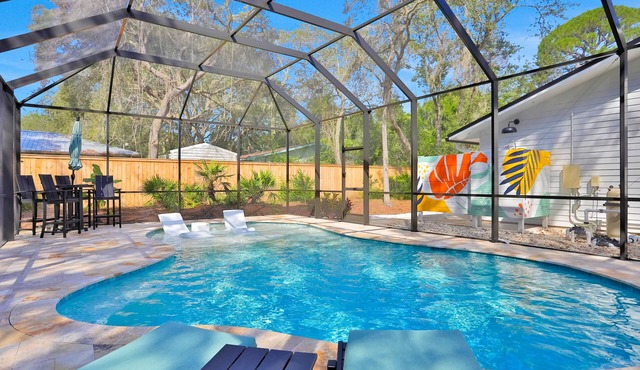 Renovated home with private pool, patio, outdoor fireplace, & grill