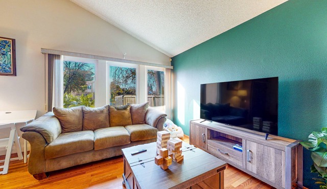 Renovated home with private seasonal pool, wood fireplace, patio, & washer/dryer