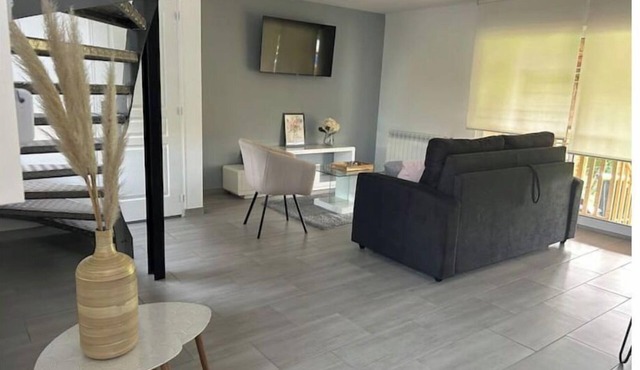 Renovated house with covered terrace and garden