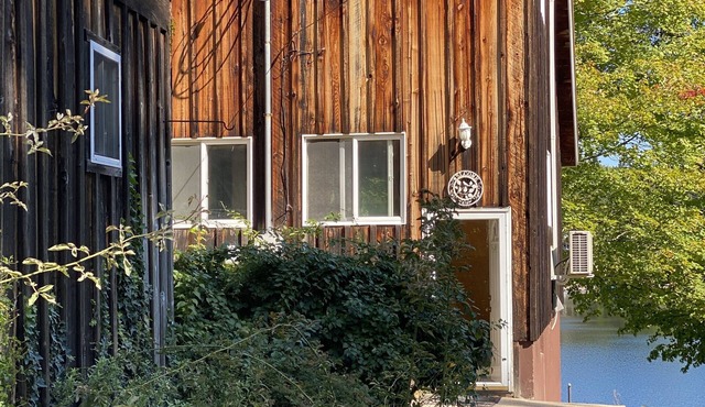 Renovated lake cabin w/raised deck & screened in porch, close to town & skiing!