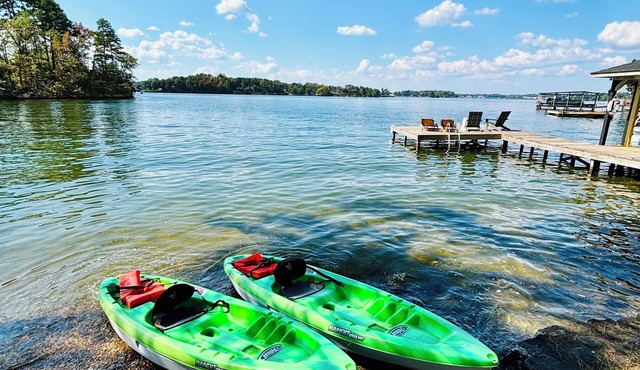 Renovated lake front home with great views & swim dock!